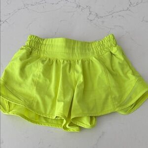 Highlight yellow Lululemon hotty hot shorts. Great condition!
